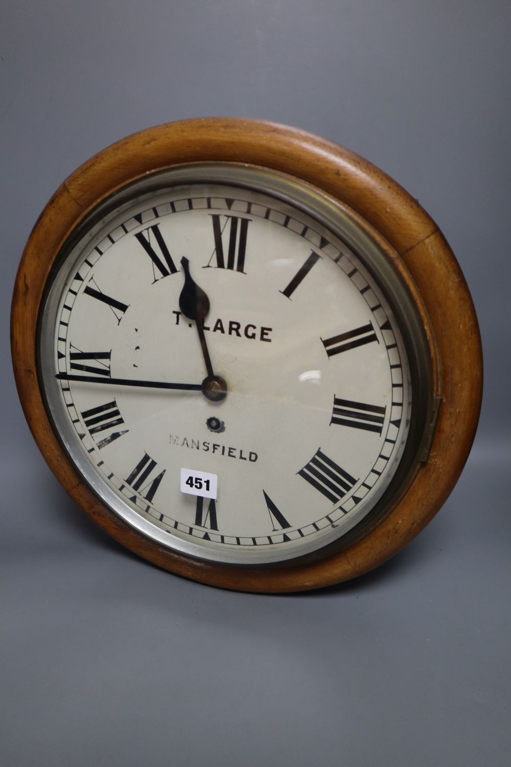 A late Victorian dial clock, the dial signed T. Marge, Mansfield, single fusee movement, oak surround, with pendulum, diameter 39cm
